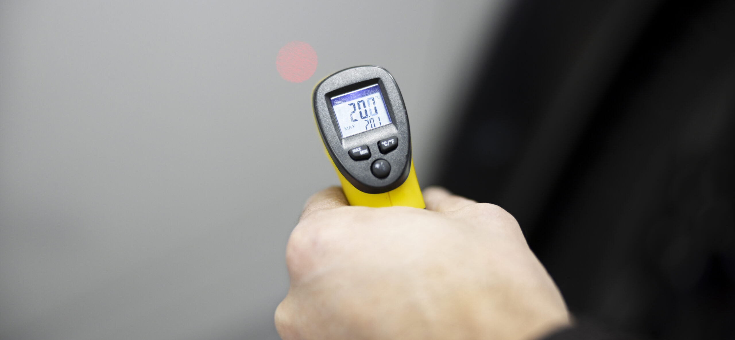 Infrared thermometer measuring ducted heating vent temperature